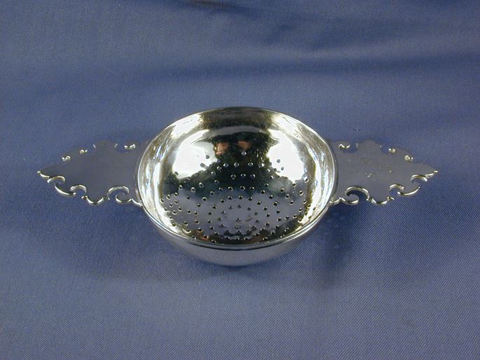 George I silver lemon strainer, the plain handles engraved with initials THS, by James Goodwin, London 1719 | MasterArt